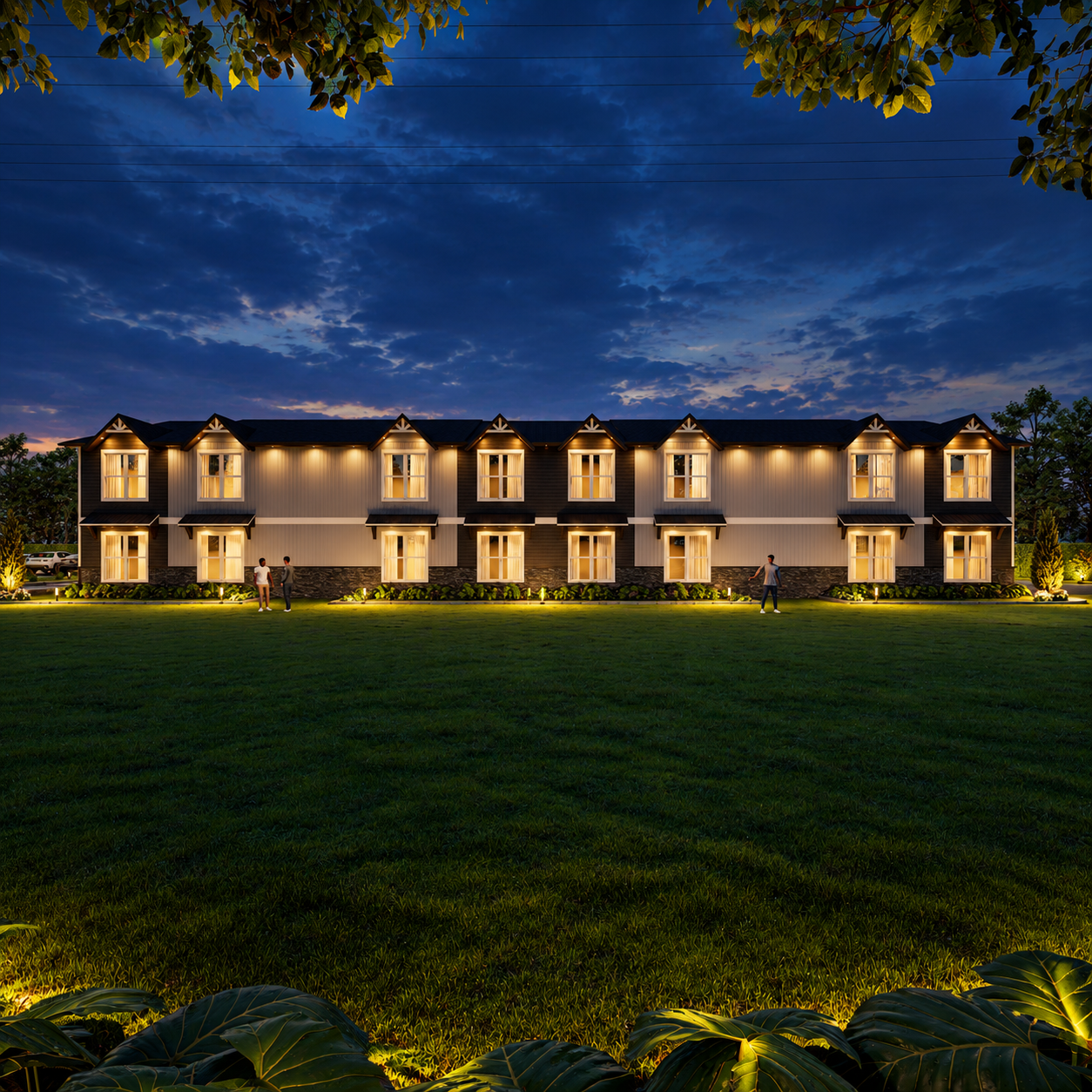 Illuminated rear elevation rendering of Apartments At Ware County at night